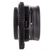 Rein mechanischer Speedbooster ohne Elektronik zwischen Objektiv und Kamera. Metabones Sony-E-Nikon-F-Speedbooster Ultra 0.71x in der Seitenansicht mit zwei geriffelten Ringen.