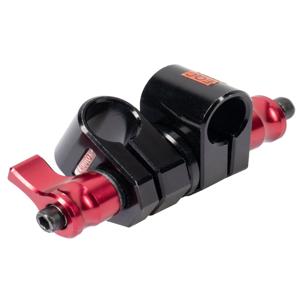 Verbindet zwei 15-mm-Rods über einen federentriegelten Zwivel mit zwei unabhängig klemmbaren Ratschenhebeln. Zacuto Z-Mount Zwivel 2 Schwenk-Adapter für zwei 15-mm-Rods mit rotem Klemmhebel, schräg von vorne gesehen.